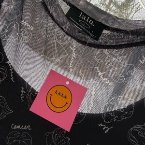 DRESSED IN LALA 
Mad About You Mesh Dress + Slip in Zodiac Love